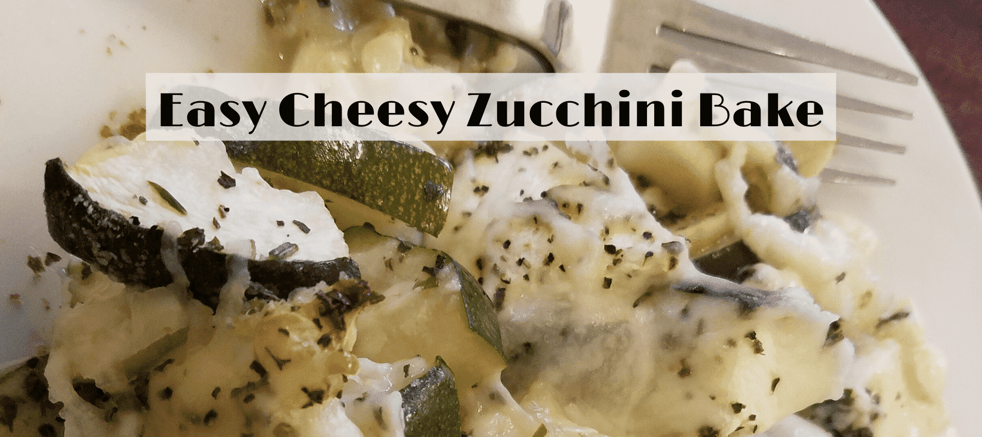 zucchini with cheese on plate with fork